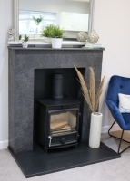 Fireplace hearth made from Neolith Krater Riverwashed